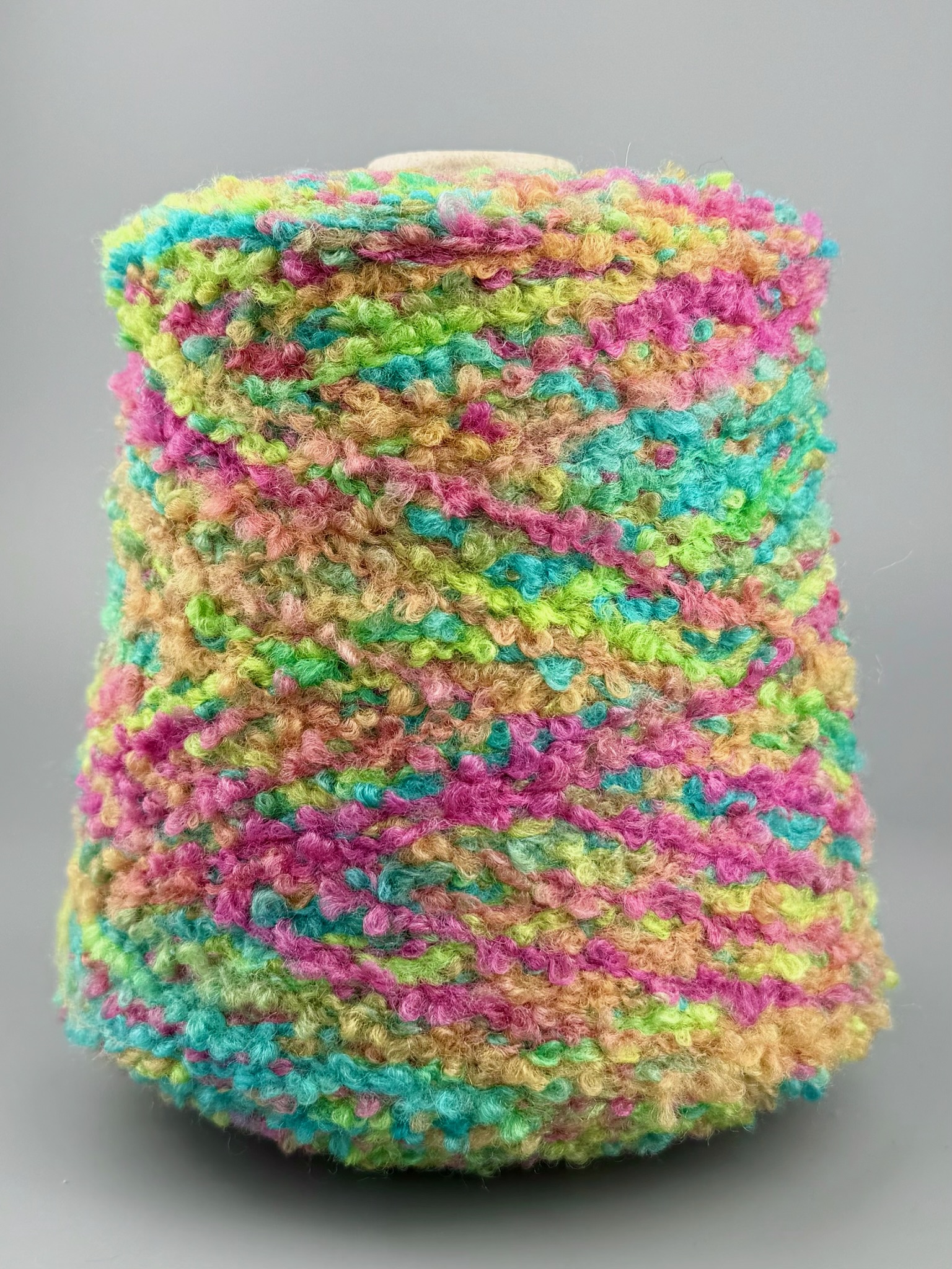 Corallo Bouclé 240m/100g – Merino Extrafine und Seide mit Elastan Pink-Limette Melange foto 2